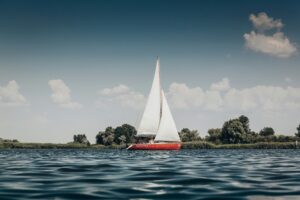 Imagine gliding across crystal-clear waters, feeling the gentle breeze on your face, and witnessing the beauty of the ocean's vast expanse.